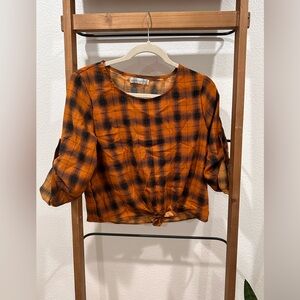 Checkered orange top, perfect for the holidays